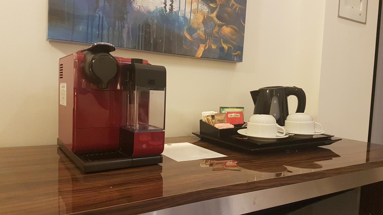 Tio Sea Resort Al Khor Exteriér fotografie A Nespresso coffee machine in a hotel room